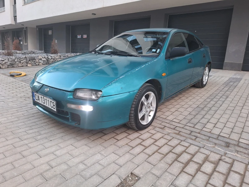 Mazda 323, снимка 7 - Автомобили и джипове - 53457819