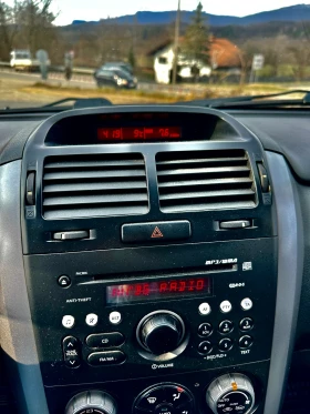 Suzuki Grand vitara 1.9 DDIS 2008г КЛИМА 4* 4, снимка 13