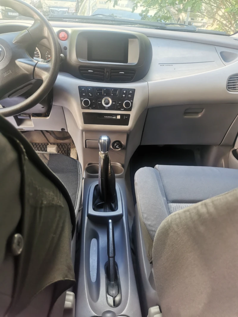 Nissan Almera tino, снимка 4 - Автомобили и джипове - 52637836