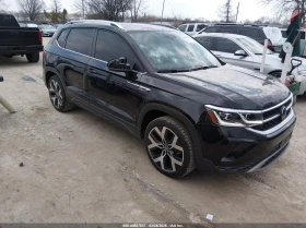 ������ VW Taos