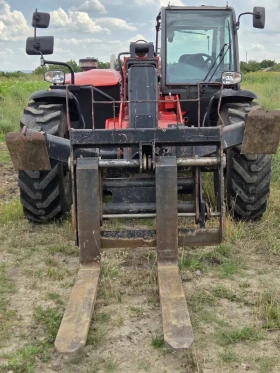 Телескопични товарачи Manitou Mt 1030, снимка 2