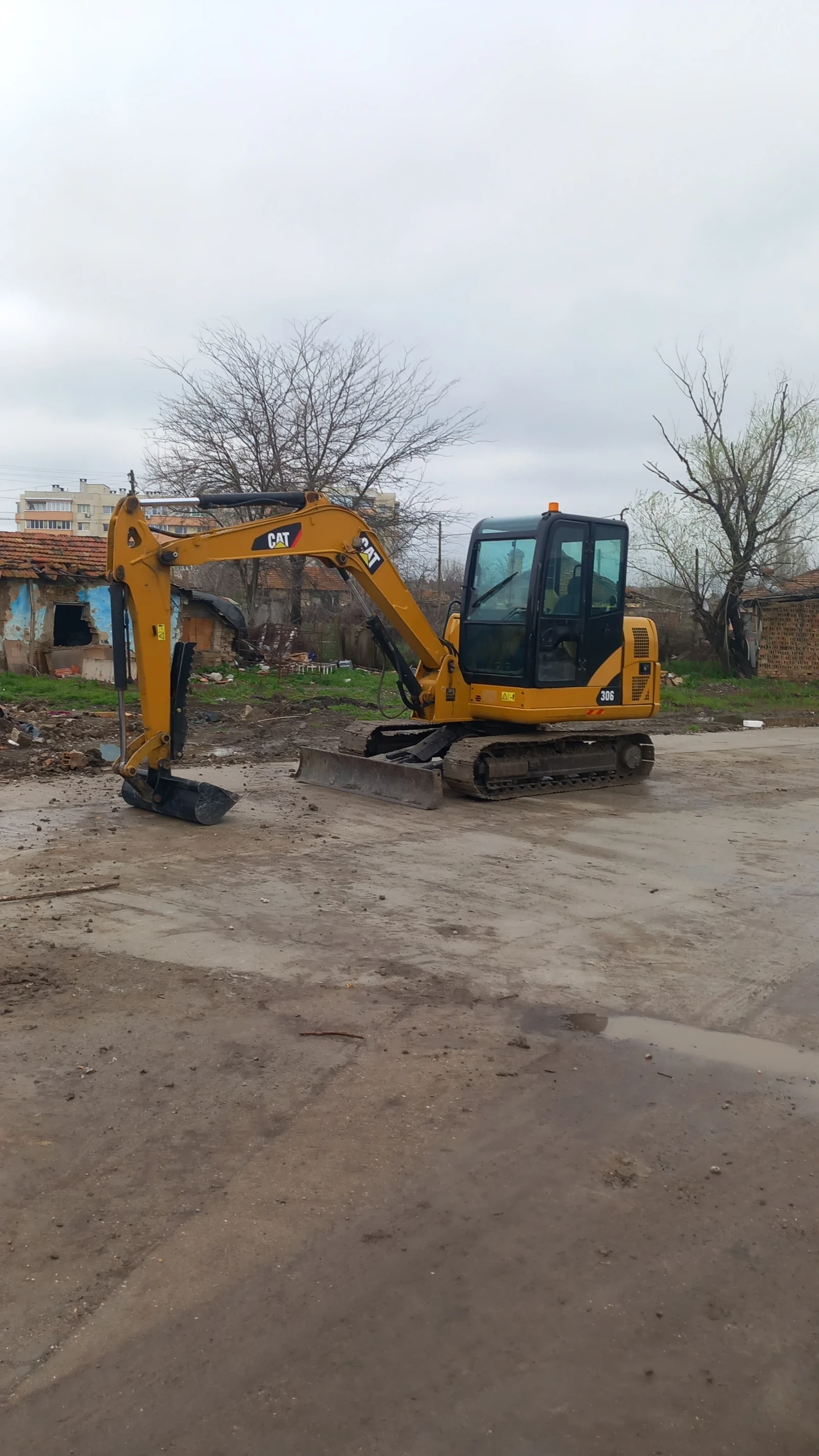 Багер Caterpillar 306