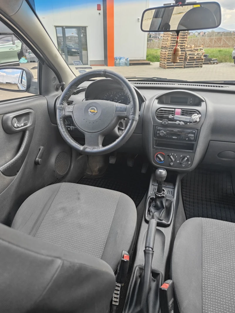 Opel Corsa 1.2, снимка 13 - Автомобили и джипове - 52570418