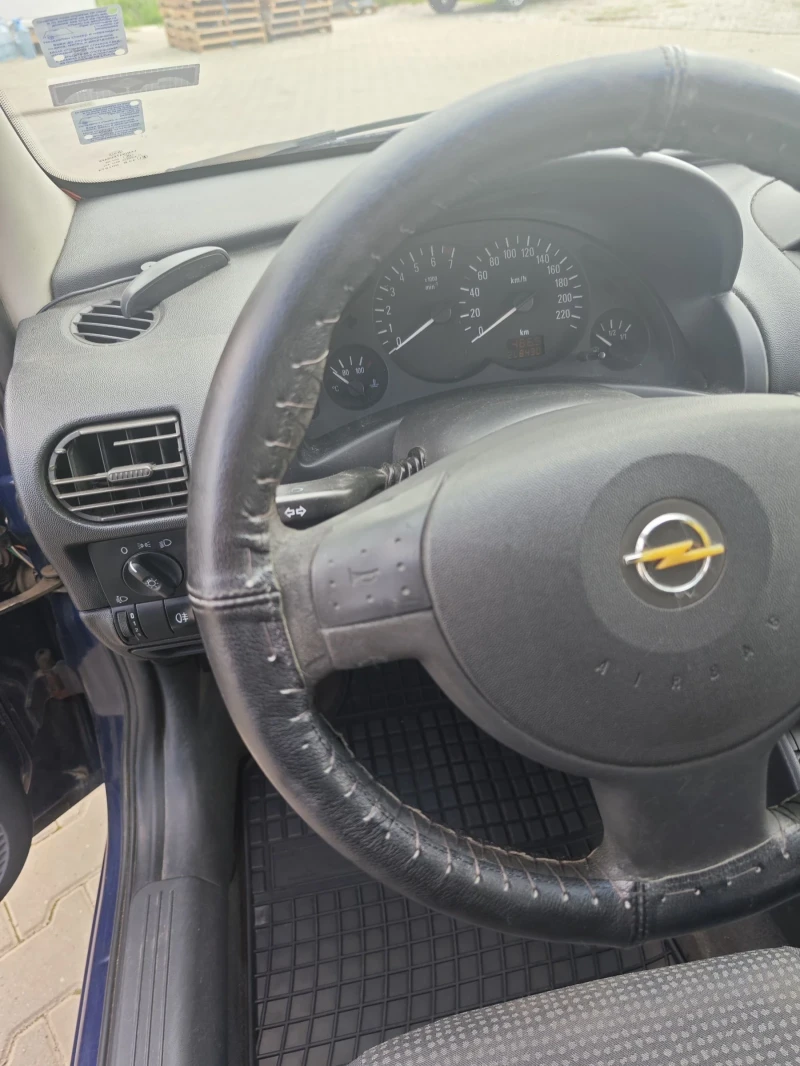 Opel Corsa 1.2, снимка 10 - Автомобили и джипове - 52570418