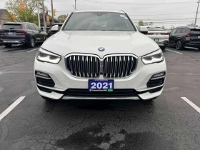 BMW X5 * xDrive40i * ПОДГРЕВИ * ПАНО * 2 КЛЮЧА * CARFAX * - 31950 € / 62488.77 лв. - 66854532 6