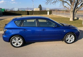 ������ Mazda 3