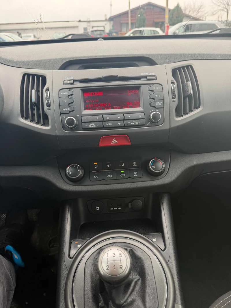Kia Sportage 2.0i 2WD EURO 5, снимка 14 - Автомобили и джипове - 53381480
