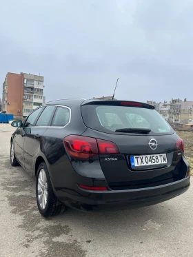 Opel Astra J Sports Tourer 1.7cdti 110кс., снимка 3