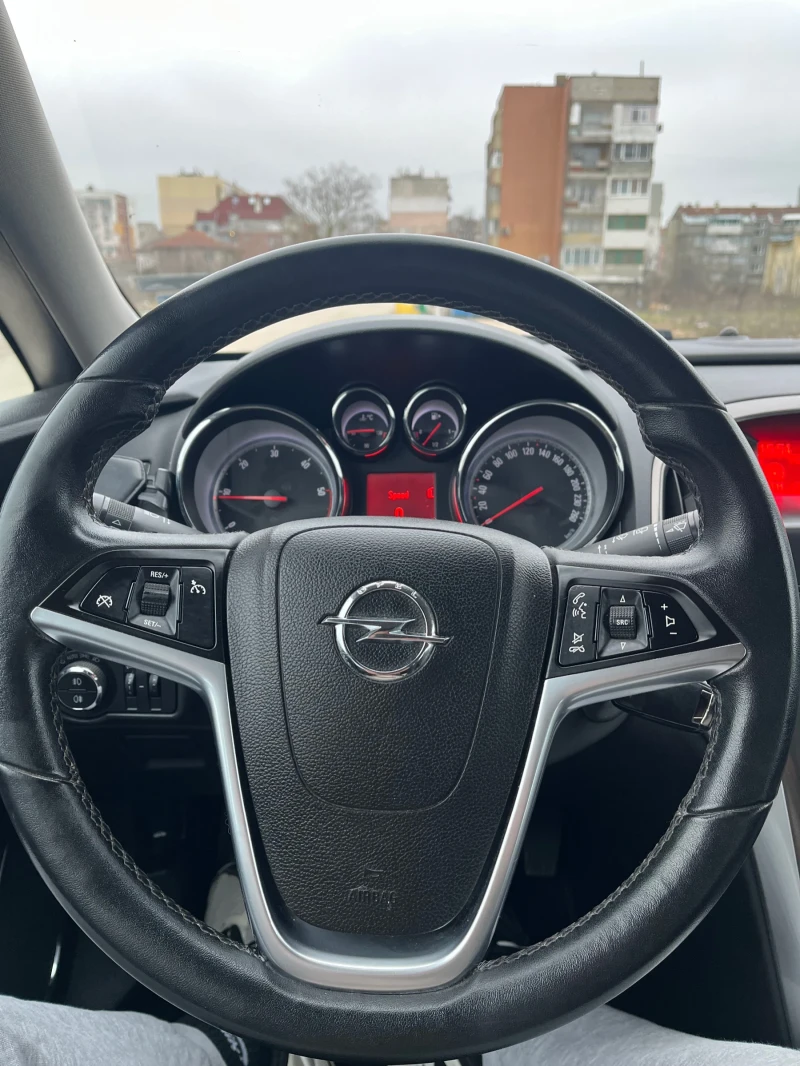 Opel Astra J Sports Tourer 1.7cdti 110кс., снимка 11 - Автомобили и джипове - 53301915