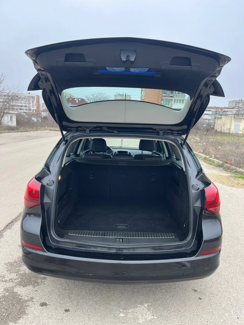 Opel Astra J Sports Tourer 1.7cdti 110кс., снимка 15 - Автомобили и джипове - 53301915