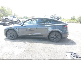 ������ Tesla Model Y