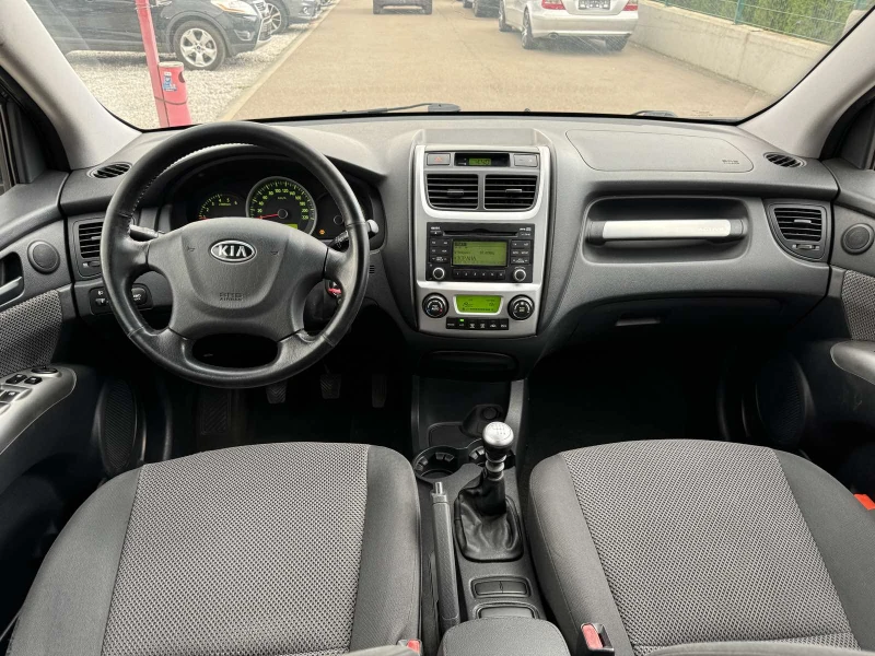 Kia Sportage 2.0TDI 4X4, снимка 11 - Автомобили и джипове - 47463249