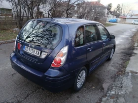 Suzuki Liana 1.4 клима  гаражен , снимка 9