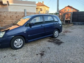 Suzuki Liana 1.4 клима  гаражен , снимка 14