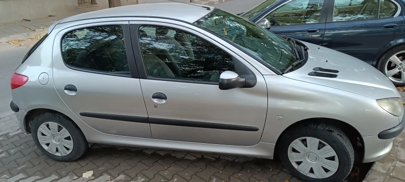 Peugeot 206, снимка 1 - Автомобили и джипове - 47656395