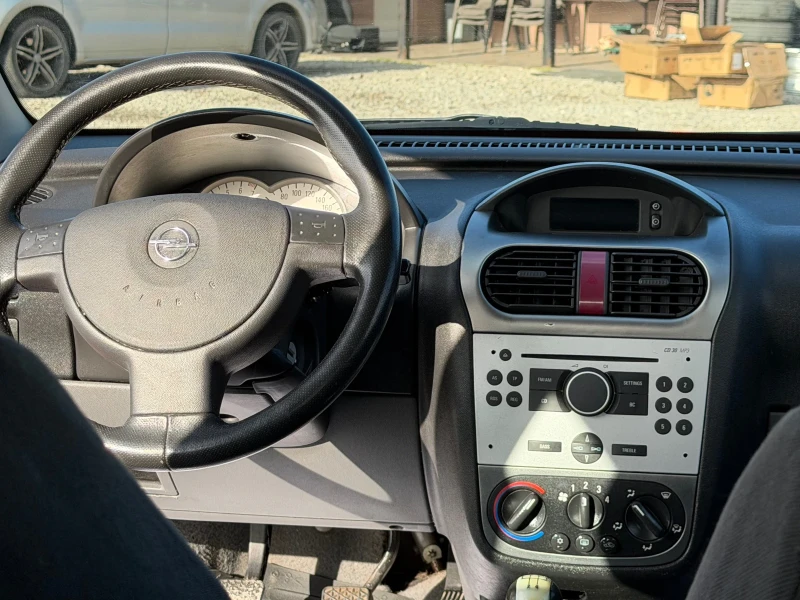 Opel Corsa 1.2i-75PS-КЛИМАТИК, снимка 12 - Автомобили и джипове - 52511225