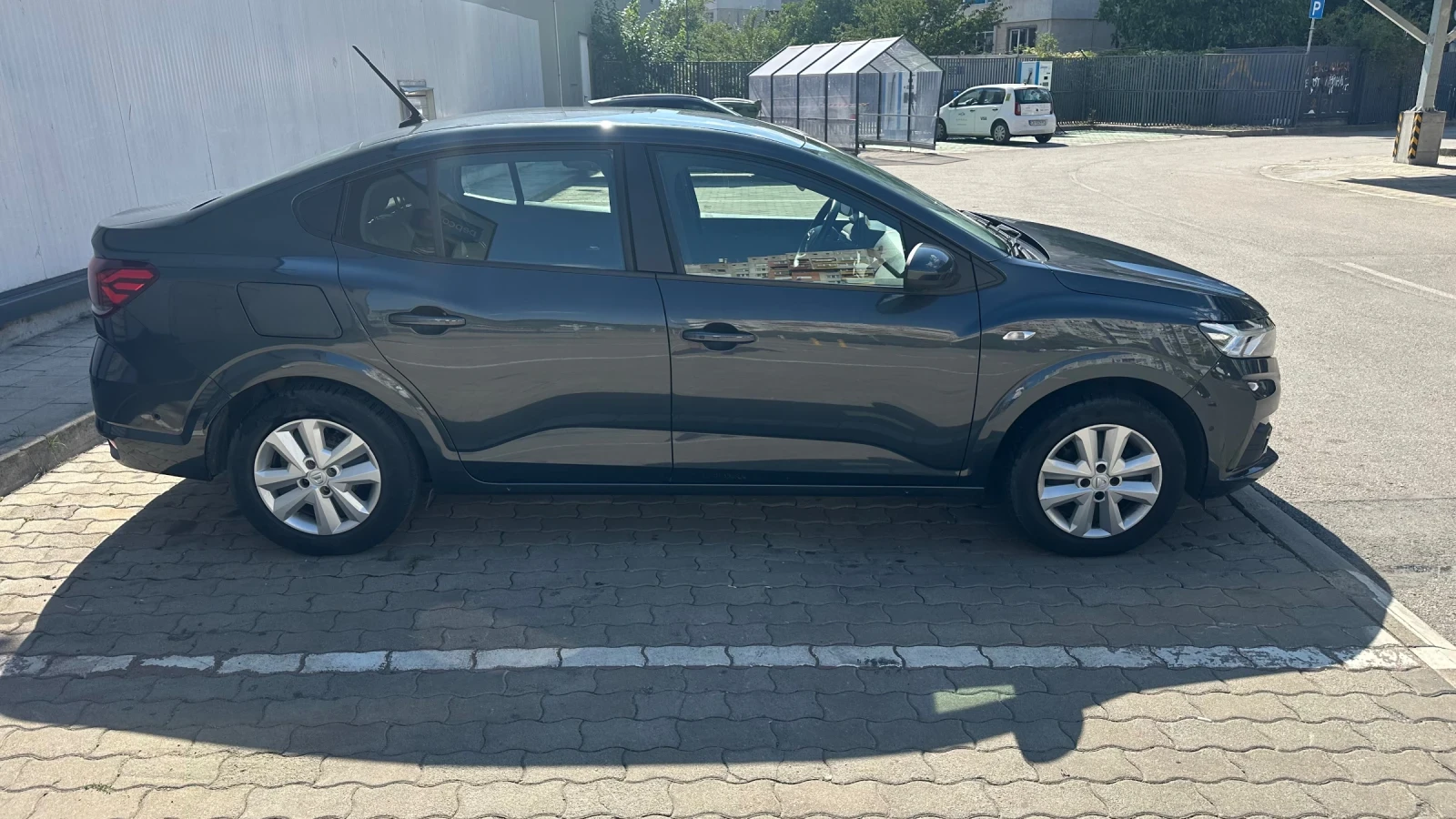 Dacia Logan, снимка 7 - Автомобили и джипове - 55535696
