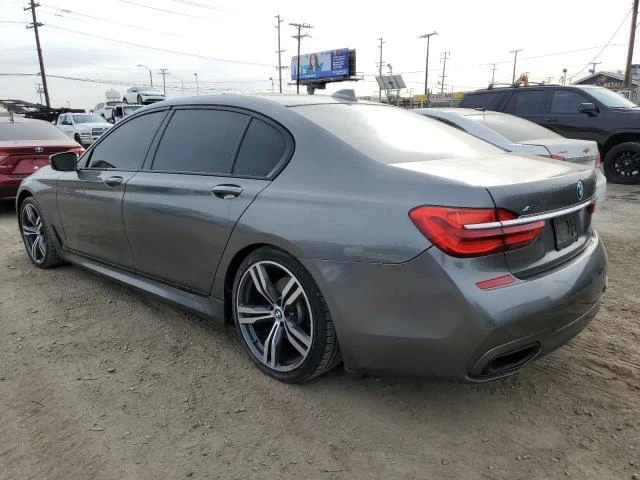 BMW 750 M* PACK* XDRIVE* ДИГИТАЛНО* ТАБЛО* МАСАЖ* ДИСТРОНИ, снимка 2 - Автомобили и джипове - 48513376