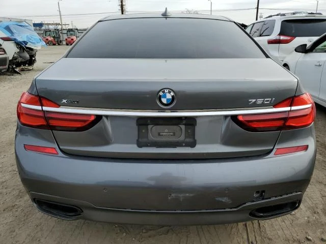 BMW 750 M* PACK* XDRIVE* ДИГИТАЛНО* ТАБЛО* МАСАЖ* ДИСТРОНИ, снимка 6 - Автомобили и джипове - 48513376