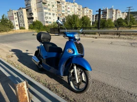  Kymco People