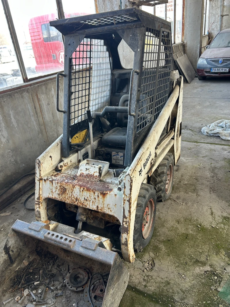 Багер Bobcat 443