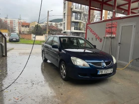 Mitsubishi Lancer 1, 6 16v - изображение 1