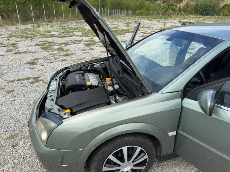 Opel Signum 2.0 i, снимка 14 - Автомобили и джипове - 51376767