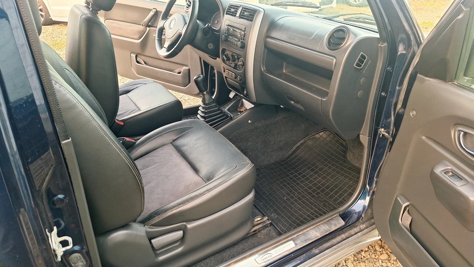 Suzuki Jimny 1.3i, снимка 12 - Автомобили и джипове - 55177735