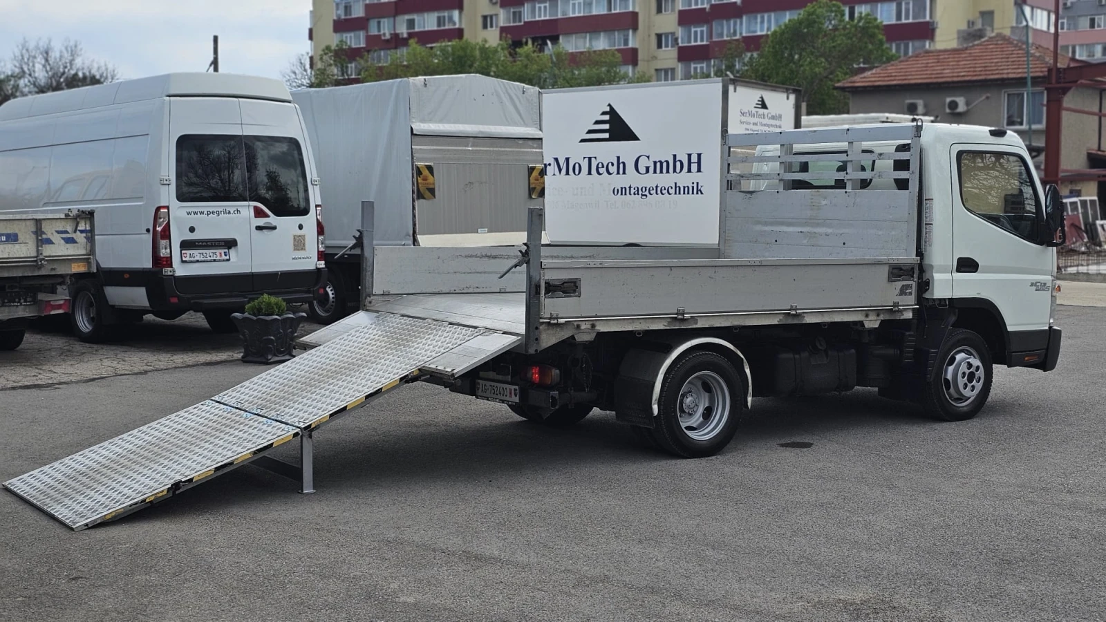 Mitsubishi Canter 3.0D 6SP CH-РАМПА-СЕРВИЗНА ИСТ.-ТРИСТРАНЕН-ЛИЗИНГ - изображение 7
