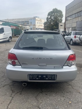     Subaru Impreza 2.0  AWD