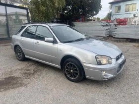     Subaru Impreza 2.0  AWD