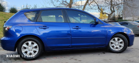 Mazda 3 1.6i.facelift, снимка 6 - Автомобили и джипове - 45064106