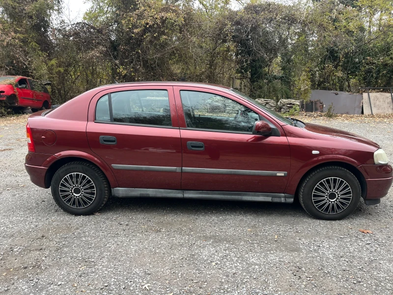 Opel Astra 1.7TDI KLIMATIK, снимка 7 - Автомобили и джипове - 47913557