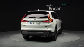 Honda Cr-v * 2.0* HYBRID TOURING* 2WD* ПОДГРЕВ* ПАНОРАМА*  | Auto.bg — изображение 4