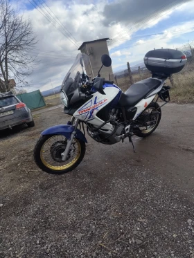 ������ Honda Xlv