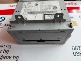 22739814  Радио/CD/DVD/GPS главно устройство Opel Astra J 22 739 814, снимка 2 - Части - 53593368