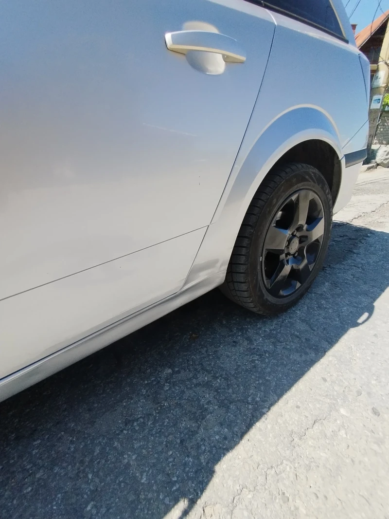Opel Astra, снимка 14 - Автомобили и джипове - 52866760