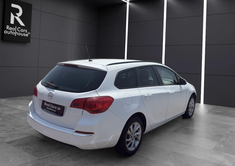 Opel Astra SPORTS TOURER* NAVI* PARKTRONIC* CLIMA* , снимка 5 - Автомобили и джипове - 51205940
