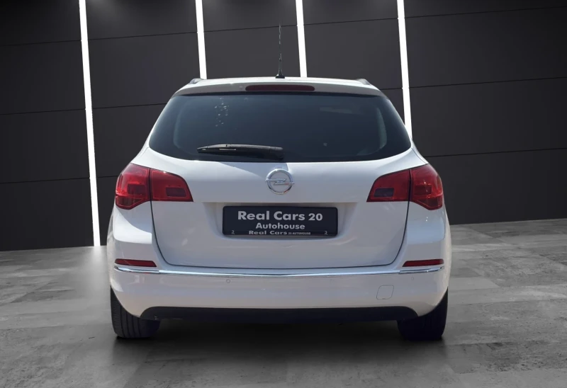 Opel Astra SPORTS TOURER* NAVI* PARKTRONIC* CLIMA* , снимка 4 - Автомобили и джипове - 51205940
