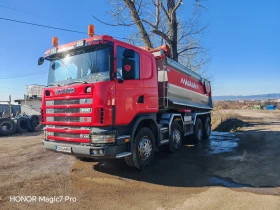 ������ Scania R 164