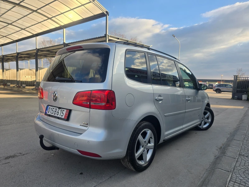 VW Touran ТОП!7м./6ск./КАМЕРА/NAVI, снимка 5 - Автомобили и джипове - 49573715