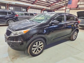 ������ Kia Sportage