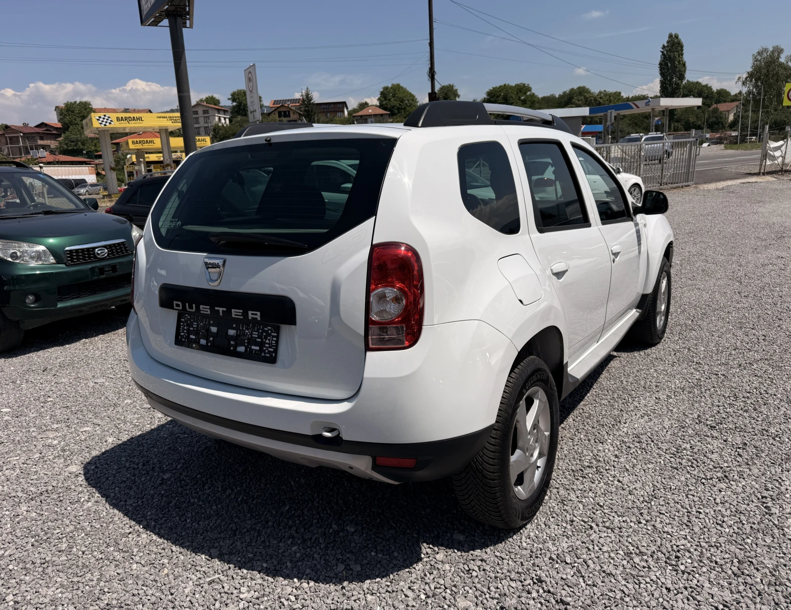 Dacia Duster 1.6i 4x4;Кожен Салон;TUV;Germany, снимка 5 - Автомобили и джипове - 55327854