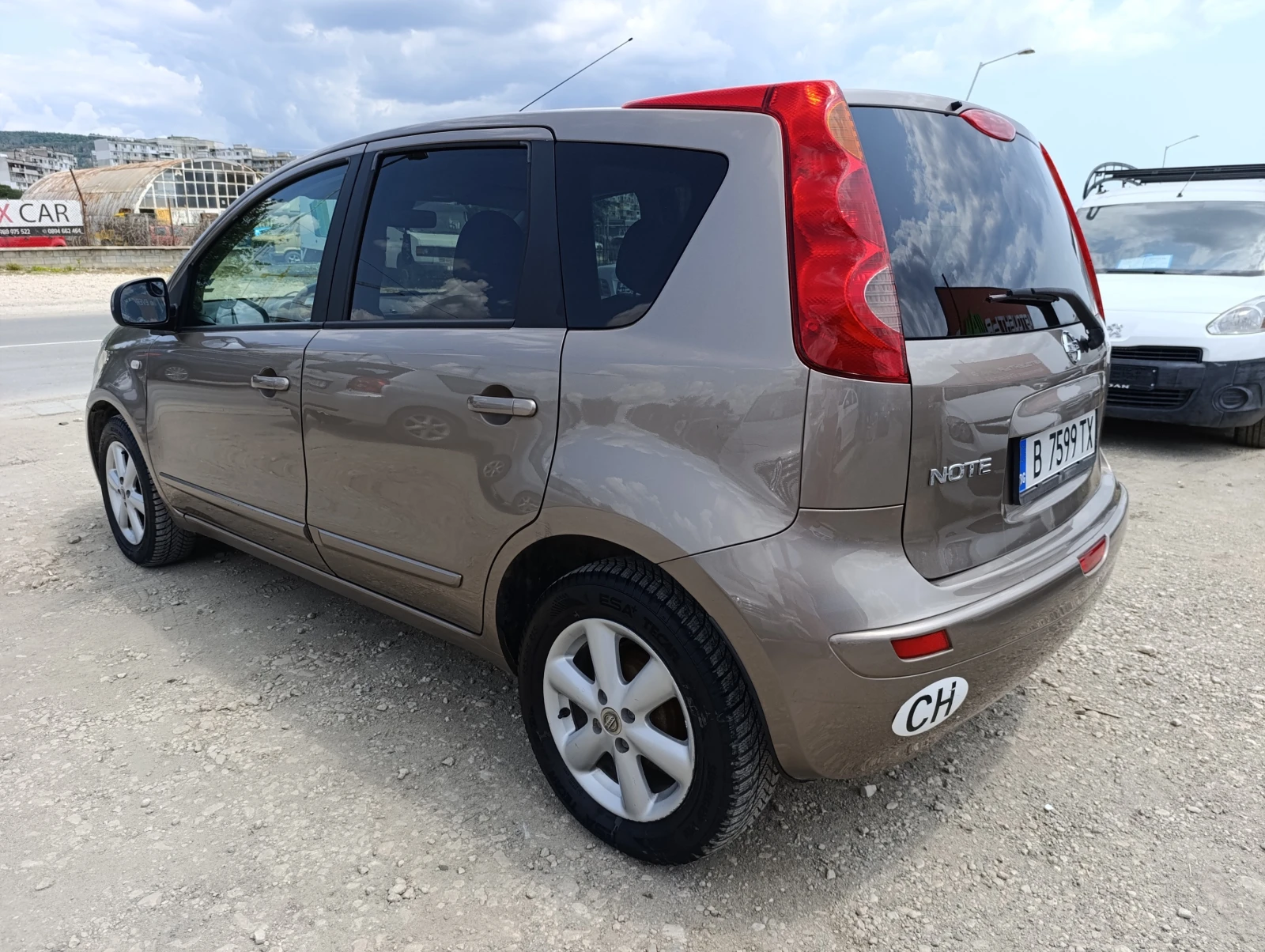 Nissan Note 1.6i 16V АВТ. - изображение 7