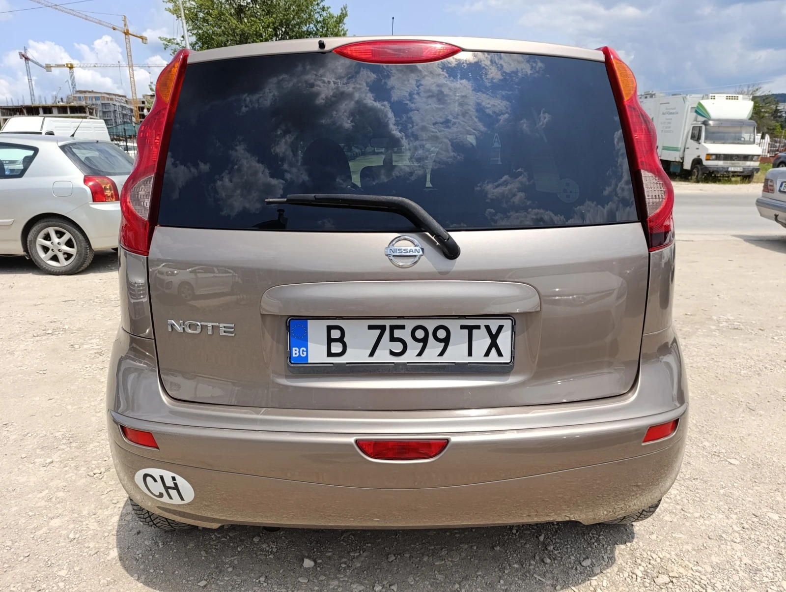 Nissan Note 1.6i 16V АВТ. - изображение 5