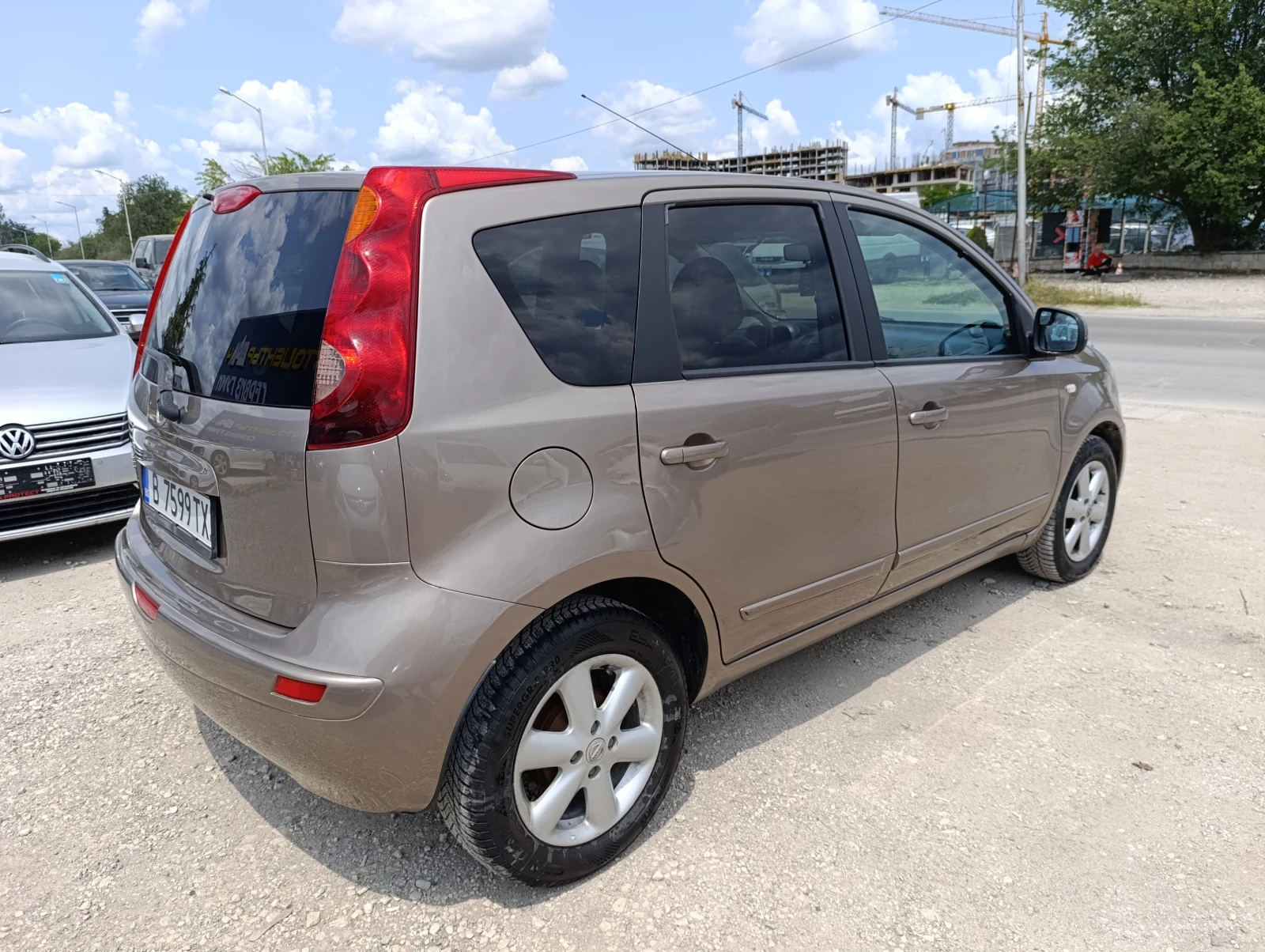 Nissan Note 1.6i 16V АВТ. - изображение 6