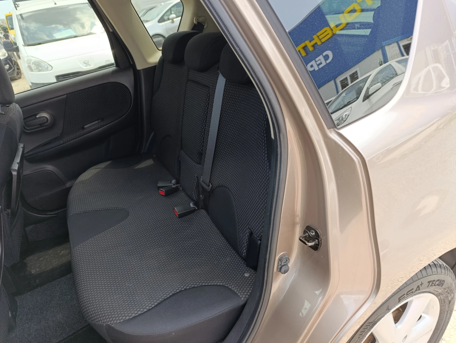 Nissan Note 1.6i 16V АВТ. - изображение 9