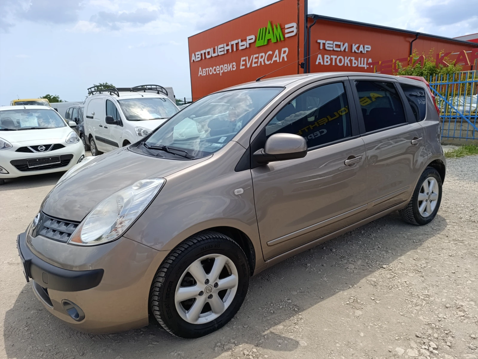 Nissan Note 1.6i 16V АВТ. - изображение 4