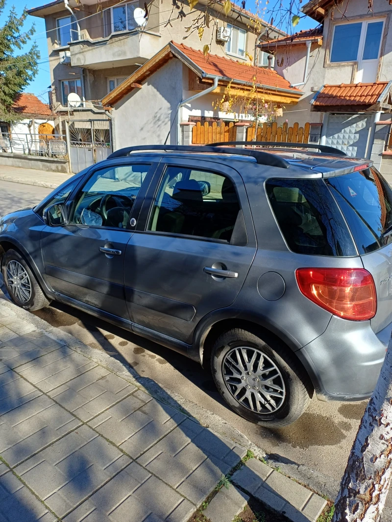 Suzuki SX4 1.6 VVT i-AWD, снимка 3 - Автомобили и джипове - 52527575