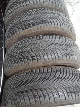 Гуми Зимни 215/65R17, снимка 1 - Гуми и джанти - 46939349